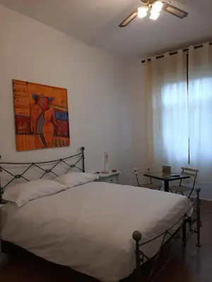 Letto o letti in una camera di Mary&Flo House - A due passi dal centro - free private parking