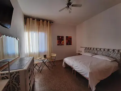 Letto o letti in una camera di Mary&Flo House - A due passi dal centro - free private parking