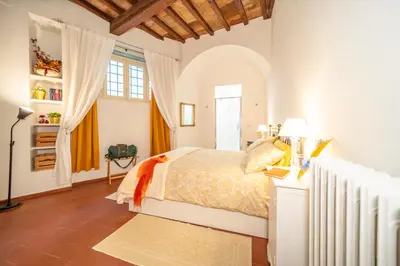 Letto o letti in una camera di Loving Santo Spirito