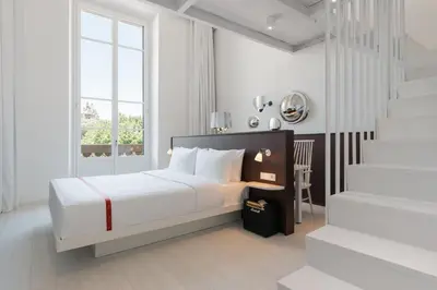 Letto o letti in una camera di Ruby Bea Hotel Florence