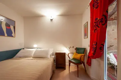 Letto o letti in una camera di Il Fico - Tintori Apt
