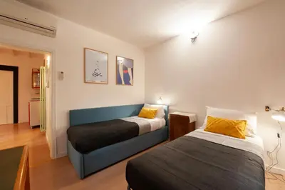 Letto o letti in una camera di Il Fico - Tintori Apt