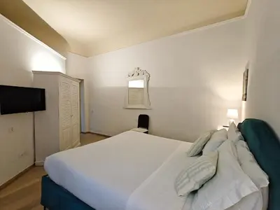 Letto o letti in una camera di Cortile Santa Monaca