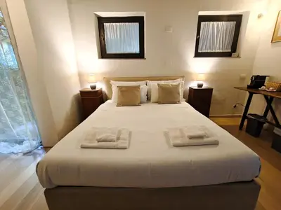 Letto o letti in una camera di Cortile Santa Monaca