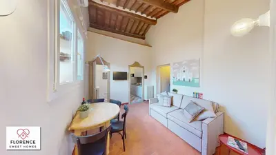 Letto o letti in una camera di Santa Croce Historical Apartment by Florence Sweet Homes