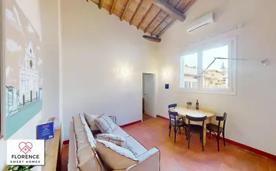 Area soggiorno di Santa Croce Historical Apartment by Florence Sweet Homes