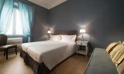 Letto o letti in una camera di San Giuliano Inn