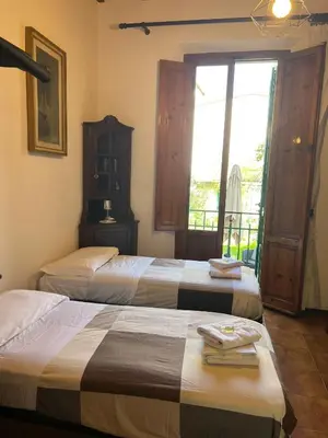 Letto o letti in una camera di Casa Spadi