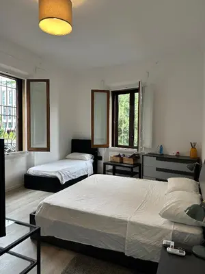 Letto o letti in una camera di GuestHouse 54