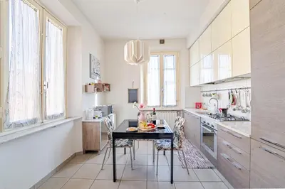Cucina o angolo cottura di Mosse Bridge Apartment by Mamo Florence