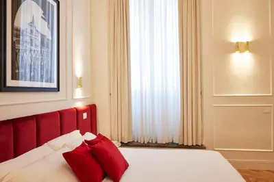 Letto o letti in una camera di Suite Residenza Quartieri Storici Duomo