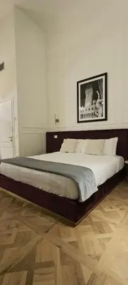 Letto o letti in una camera di Suite Residenza Quartieri Storici Duomo