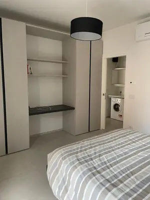 Letto o letti in una camera di RP Apartment
