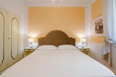 Letto o letti in una camera di Ponte Vecchio Escape Suite