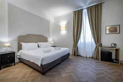 Letto o letti in una camera di Residenza d'epoca Poliziano
