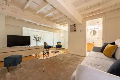 TV o dispositivi per l'intrattenimento presso Apartments Florence - Grant Palagio 1 bedroom in Duomo