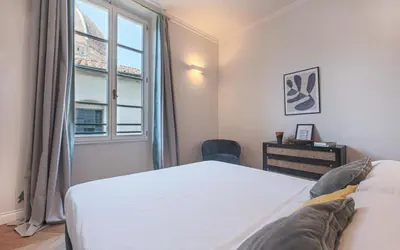 Letto o letti in una camera di Apartments Florence- Bufalini Exclusive