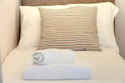Letto o letti in una camera di San Gallo 23 APT