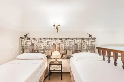 Letto o letti in una camera di Calzaiuoli Adapartments Collection
