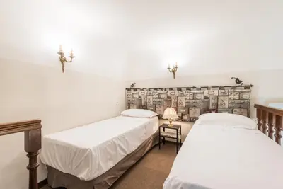 Letto o letti in una camera di Calzaiuoli Adapartments Collection