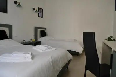 Letto o letti in una camera di Dion Guest House