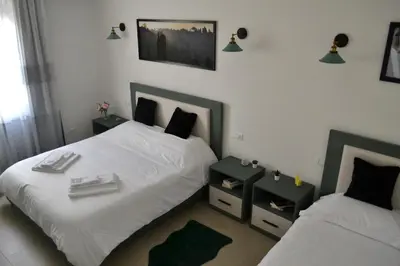 Letto o letti in una camera di Dion Guest House