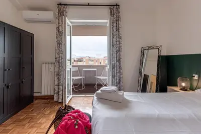 Letto o letti in una camera di Balcone sul Verde - Sweet Dreams in Florence