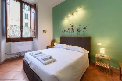 Letto o letti in una camera di Gaddi by Mmega