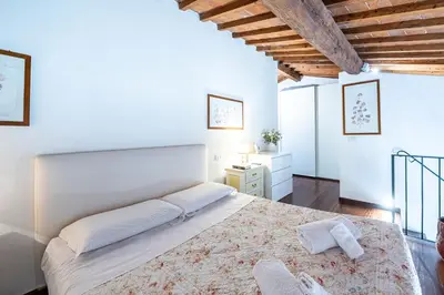 Letto o letti in una camera di Parione loft in town center
