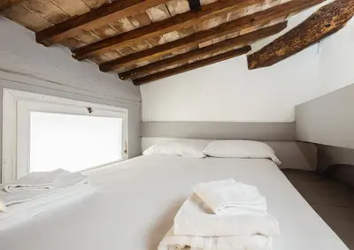 Letto o letti in una camera di Le Casine Firenze