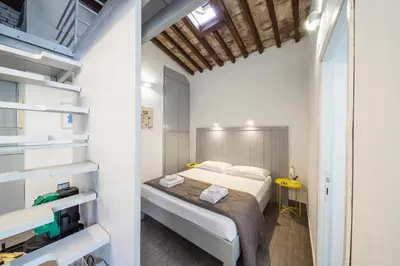 Letto o letti in una camera di Le Casine Firenze