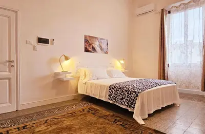 Letto o letti in una camera di Venere SuperCentral B&B