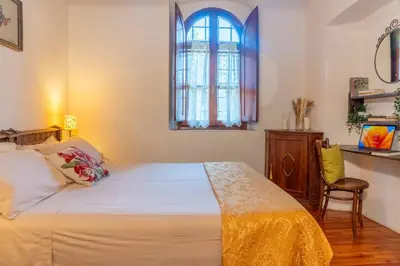 Letto o letti in una camera di Charming Florentine Hideout