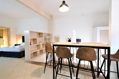 Letto o letti in una camera di Wine Apartments Florence Amarone