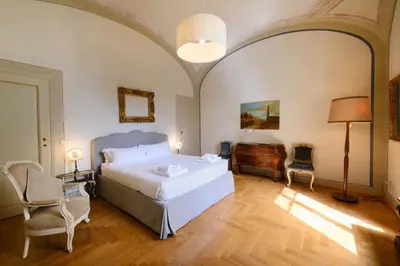 Letto o letti in una camera di Santa Maria Novella deluxe Apartment
