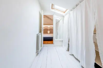 Letto o letti in una camera di Genteel Home Scarlatti