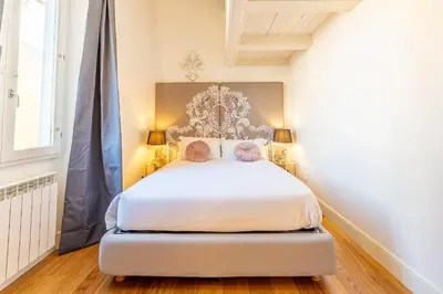 Letto o letti in una camera di Genteel Home Scarlatti