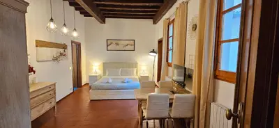 Letto o letti in una camera di Il Loft degli Albizi