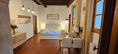 Letto o letti in una camera di Il Loft degli Albizi