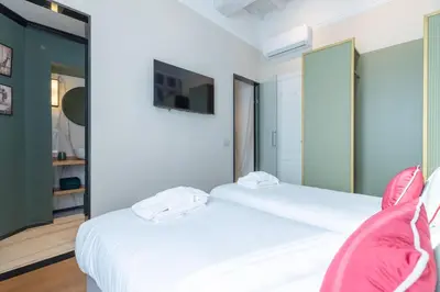 Letto o letti in una camera di Design Florence Suite in Florence