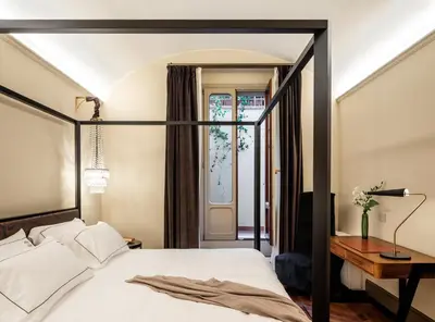 Letto o letti in una camera di This Time Tomorrow in Florence