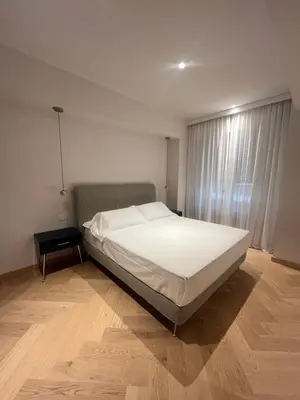 Letto o letti in una camera di The Old Palace- Luxury Suites Signoria