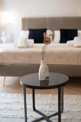 Letto o letti in una camera di The Old Palace- Luxury Suites Signoria