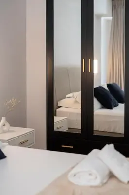 Letto o letti in una camera di The Old Palace- Luxury Suites Signoria