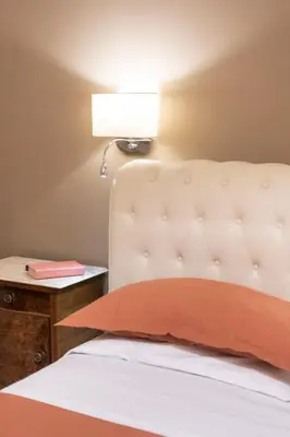 Letto o letti in una camera di Historic Apartment Borgo Ognissanti, 8 Florence