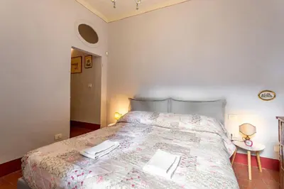 Letto o letti in una camera di Santa Croce Dante's View Apartment with Terrace by Halldis