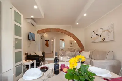 Area soggiorno di Fossi - Flo Apartments