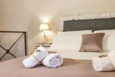 Letto o letti in una camera di Castellare Loft appartamento in collina a Firenze