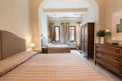 Letto o letti in una camera di Apartments Florence - Ariento Giuditta 2 bdr