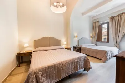 Letto o letti in una camera di Apartments Florence - Ariento Giuditta 2 bdr